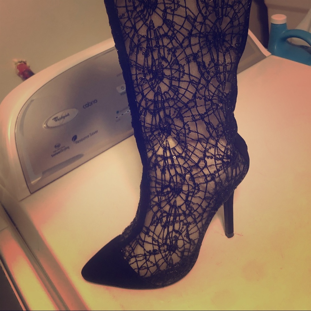 Black boots with lace design